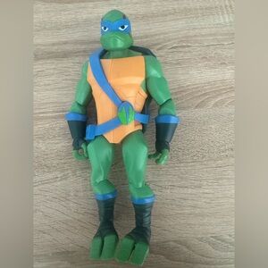 Green and Orange Action Figure